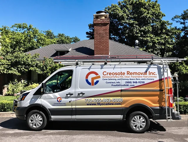 Sharon Chimney Sweep technician removing creosote safely in Sharon, MA
